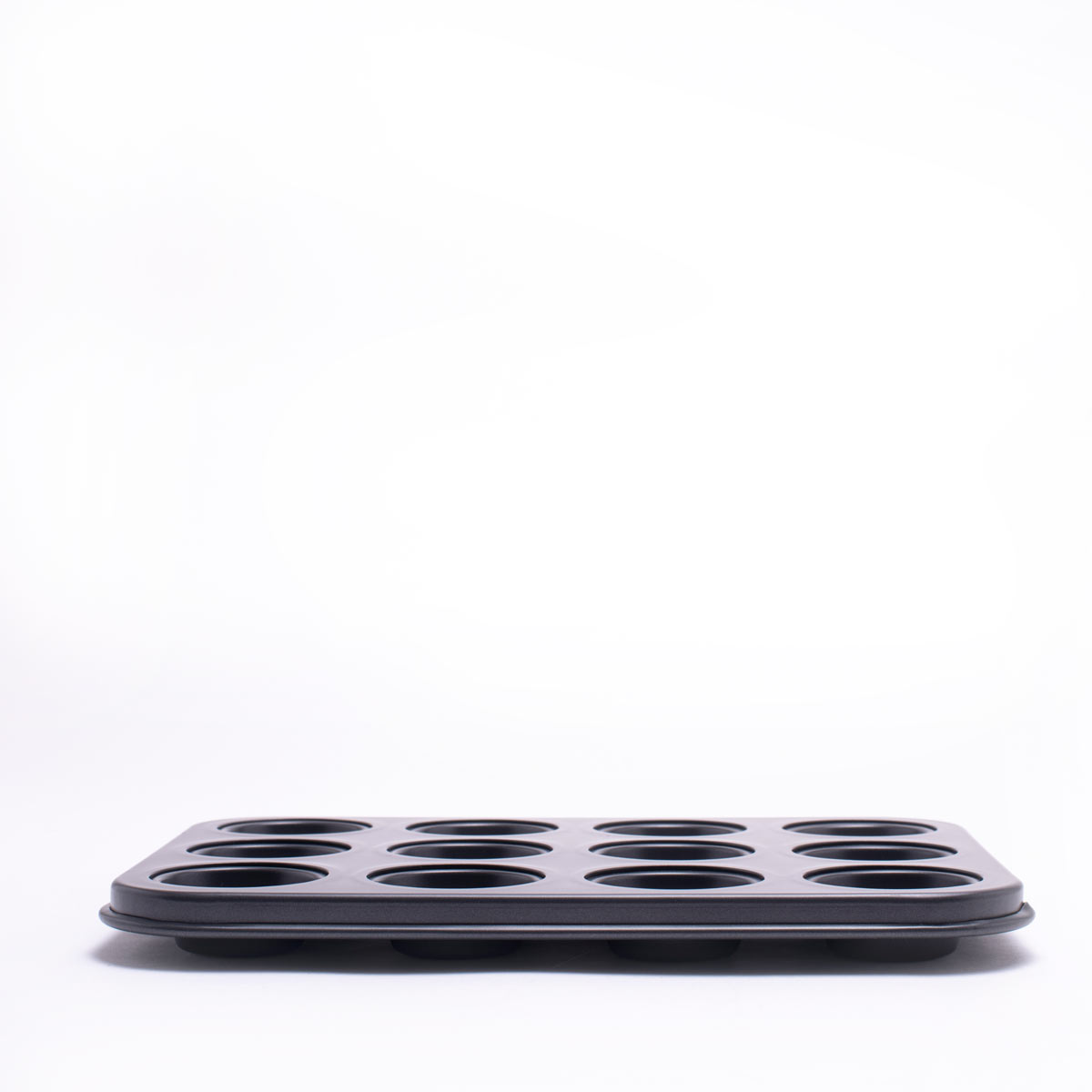 Форма для выпечки кексов/маффинов PROFFI на 12шт 26,5x19,5x2см с премиальным антипригарным покрытием Teflon. Материал: углеродистая сталь. Толщина: 0,8мм от магазина Gipfel 9504 